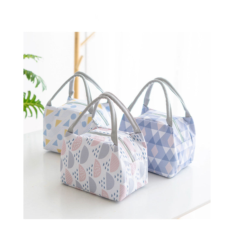 Insulated Lunch Bag — two bags styled with bamboo backdrop
