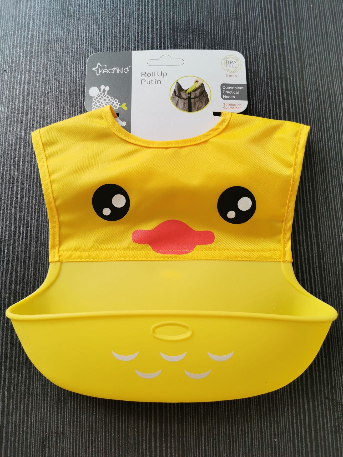 Yellow duck silicone baby bib for mealtime messes