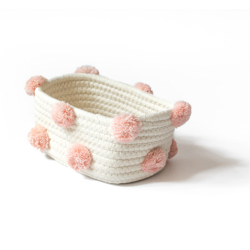 Cotton Rope Storage Basket — white basket with pink pom poms