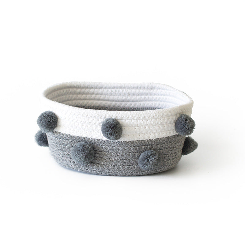 Cotton Rope Storage Basket — grey oval basket with grey pom poms