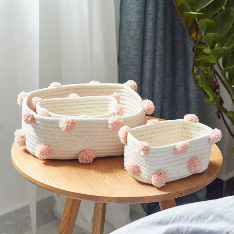 Cotton Rope Storage Basket — pom pom baskets styled on a wooden side table