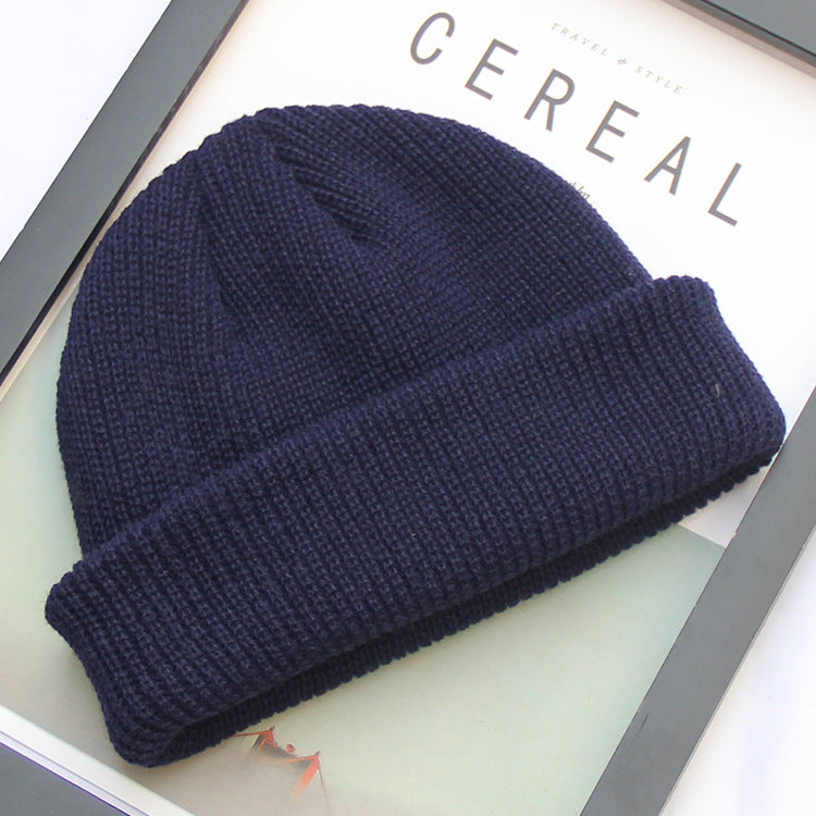 Navy blue ribbed knit fisherman beanie