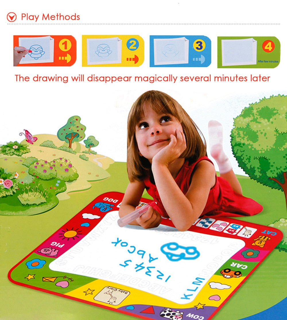 Girl drawing on the water doodle mat with magic pen