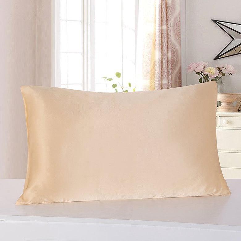 Satin Pillowcase — champagne satin pillowcase on a bed