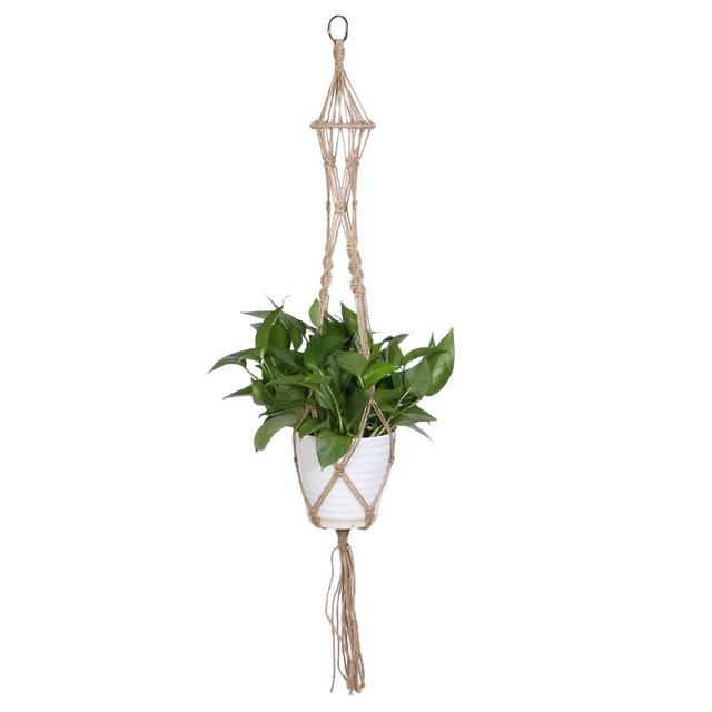 Macrame Plant Hanger — long macrame hanger holding a potted green plant