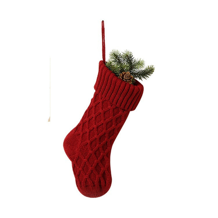Cable Knit Christmas Stocking — red stocking with pine sprigs