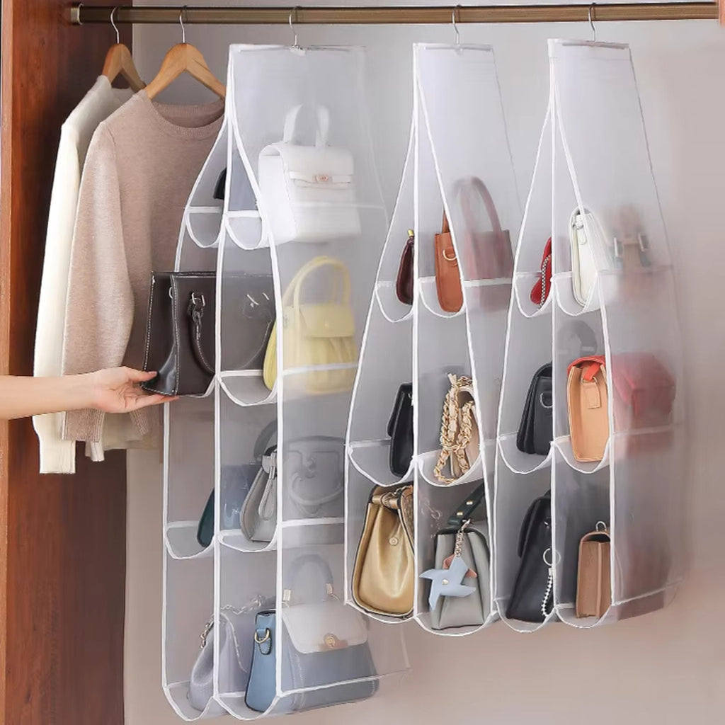 Hanging Closet Organizer — placing a handbag into one of the six clear pockets