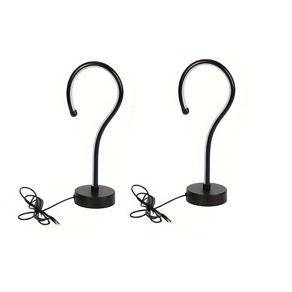Two curve LED lamps with USB cables on white background