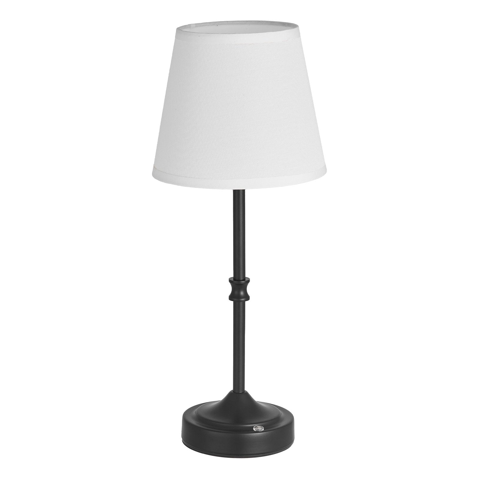 Standard size cordless table lamp with white fabric shade and black metal base on white background