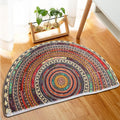 Half-Round Medallion Door Mat — colorful medallion pattern shown on a wood floor