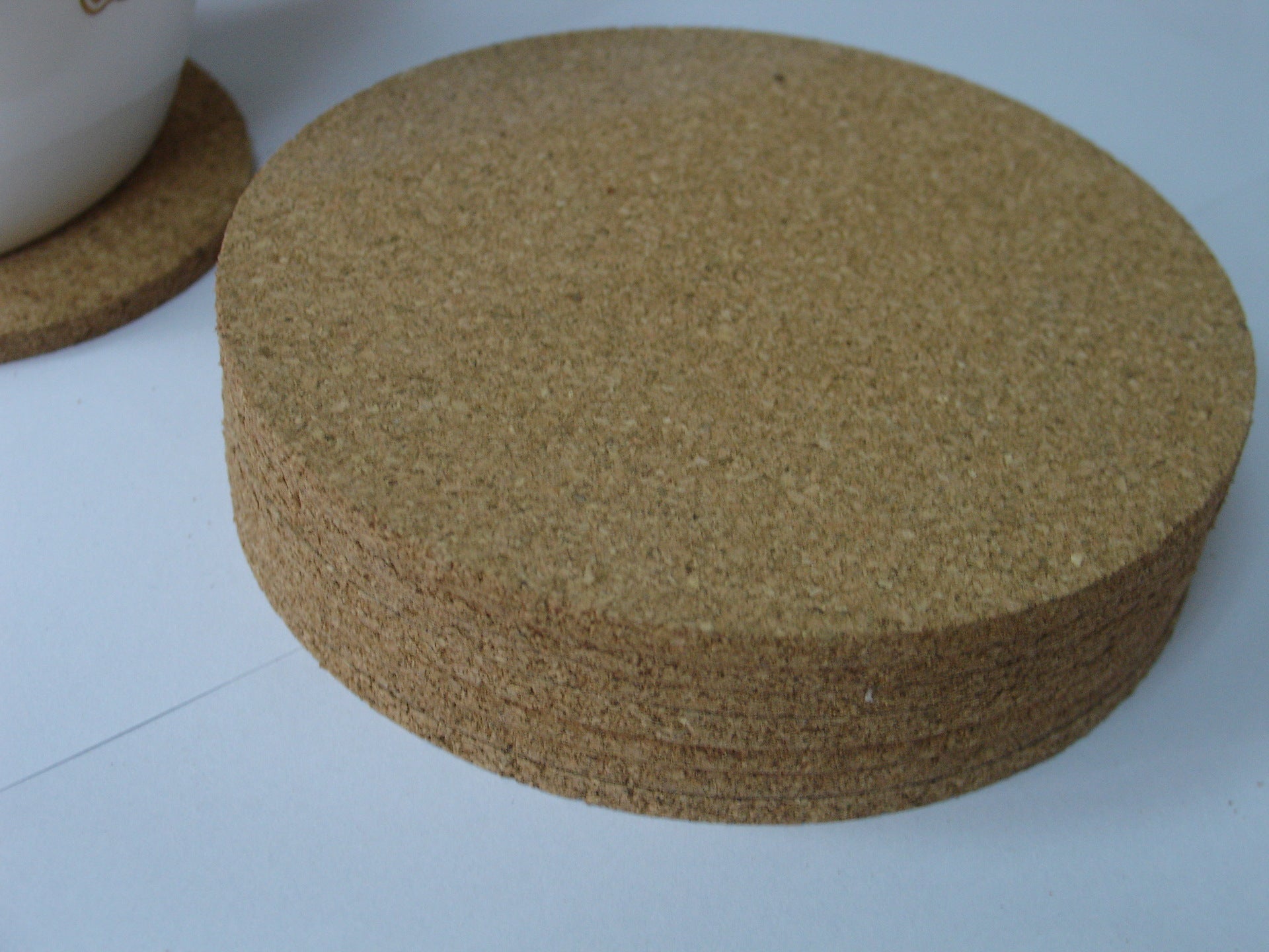 Cork Coasters, Set of 6 — stack of six coasters, side view