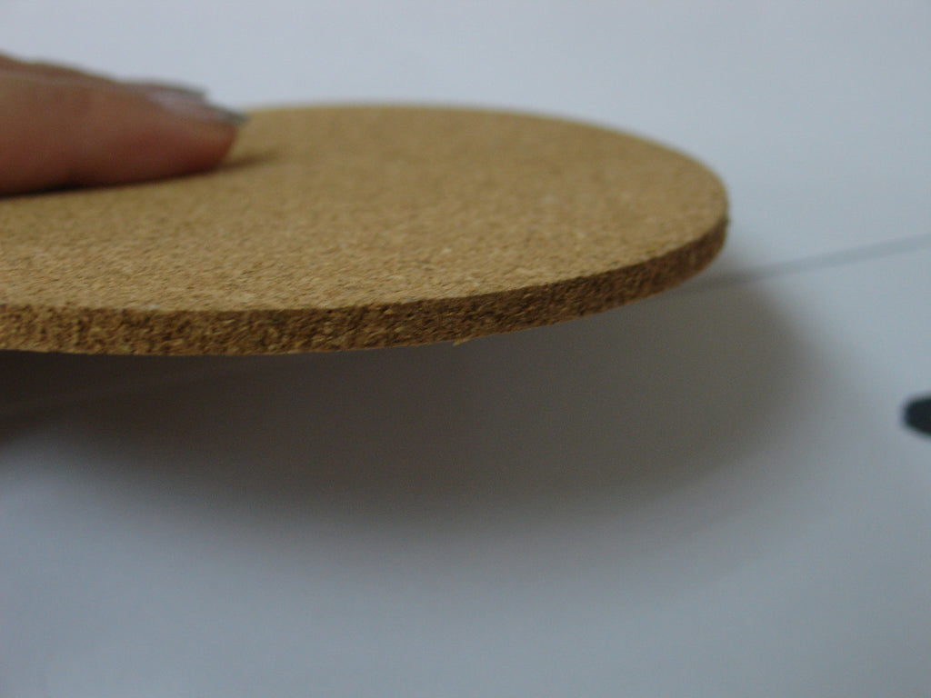 Cork Coasters, Set of 6 — single coaster held showing thickness