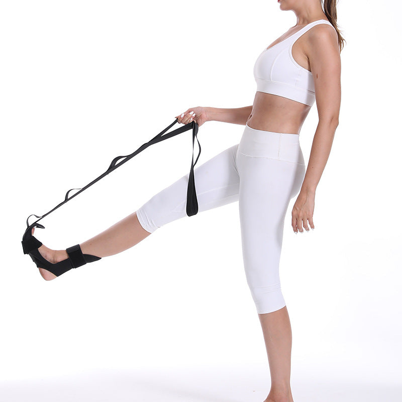 Adjustable Yoga Stretch Strap — standing leg stretch using the strap