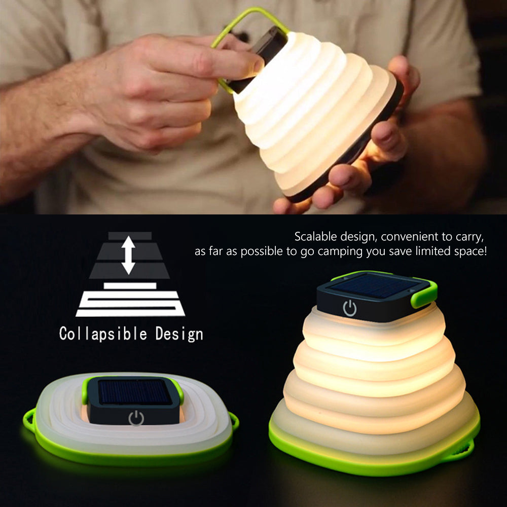 Collapsible solar camping lantern glowing warmly at a campsite at night