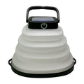 Black solar camping lantern collapsed flat for packing