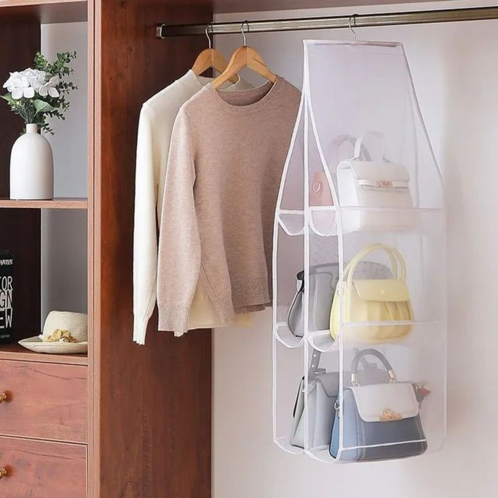 Hanging Closet Organizer — hanging in a closet storing handbags beside clothes