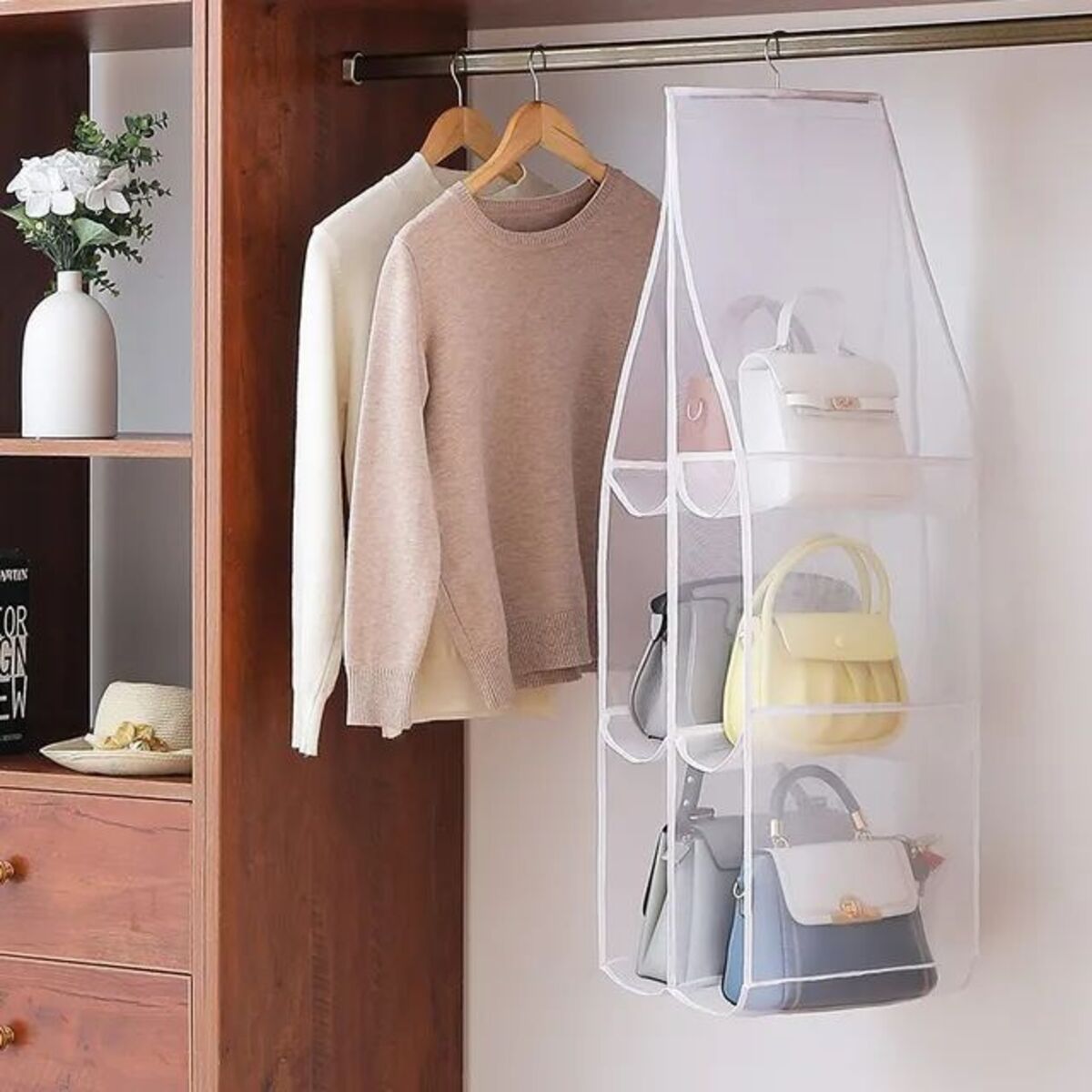 Hanging Closet Organizer — hanging in a closet storing handbags beside clothes