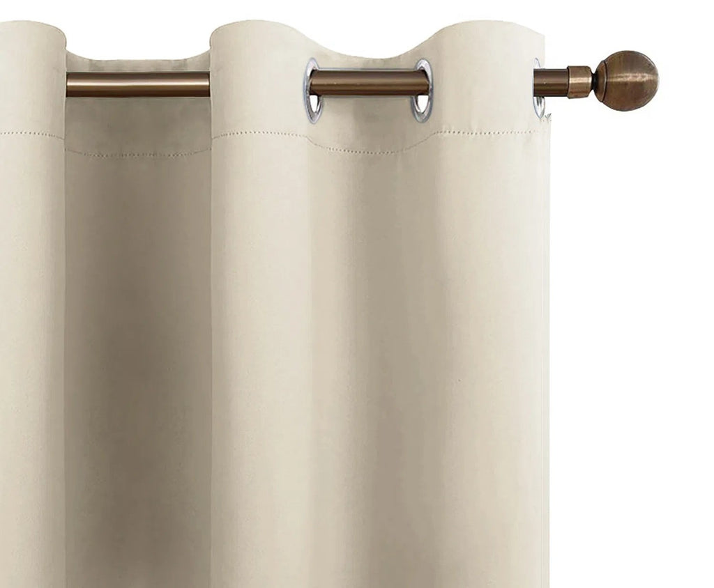 Blackout curtain grommets on rod close-up