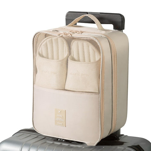 3 Layer Travel Shoe Bag — beige, on suitcase handle