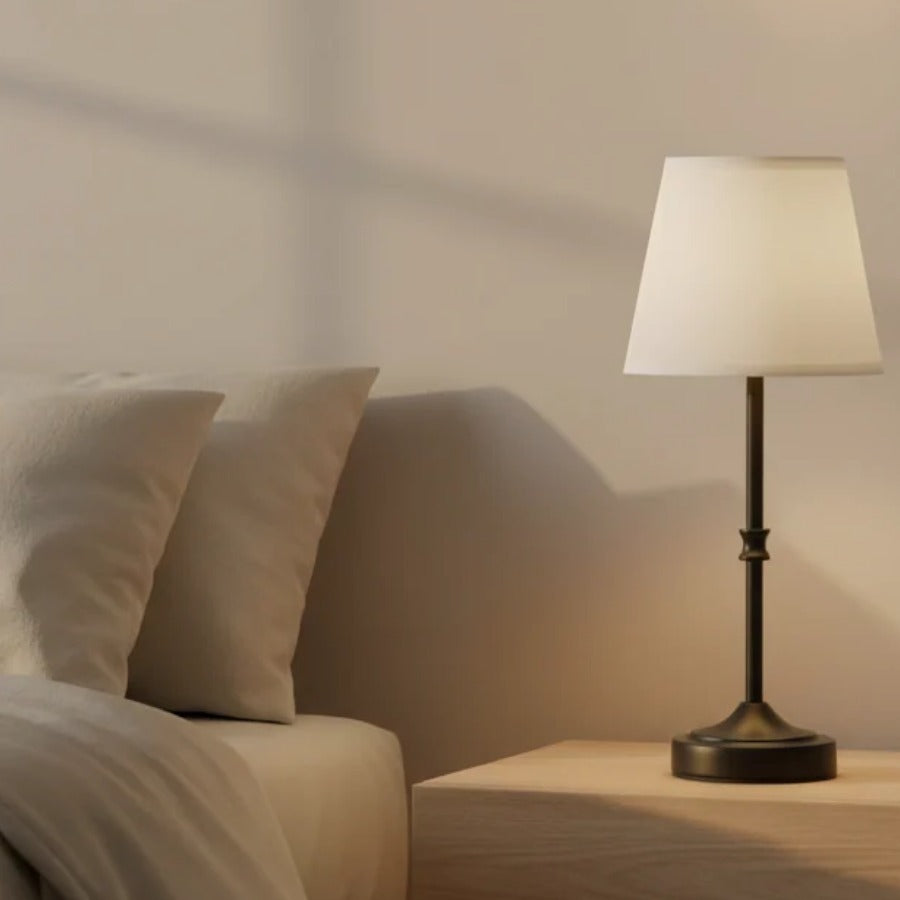 Cordless Table Lamp on a nightstand, warm glow detail