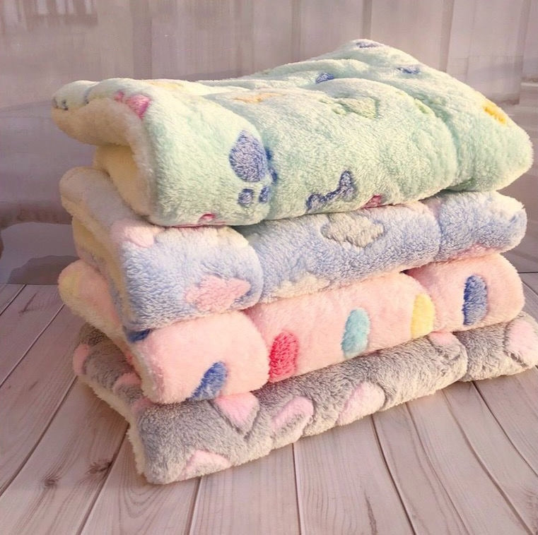 Soft Flannel Pet Blanket — folded stack of flannel blankets