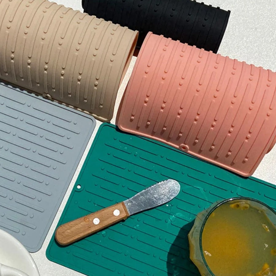 Silicone Dish Drying Mat — rolled mat showing the ribbed surface