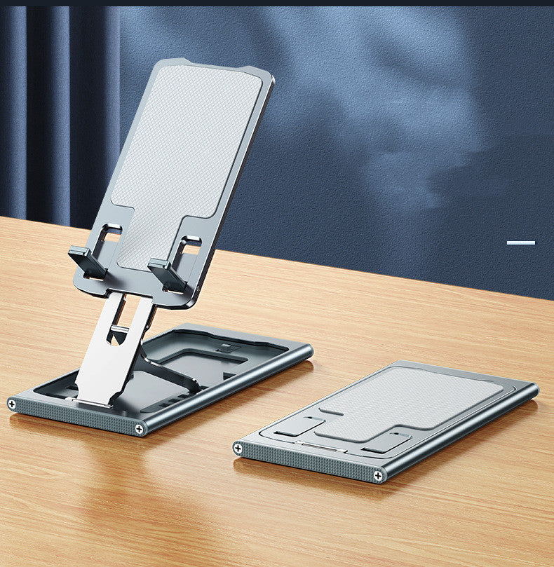 Grey folding aluminum phone stand shown with phone