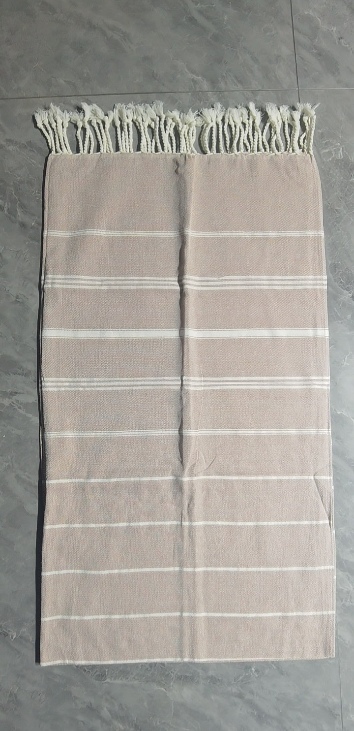 Khaki Turkish beach towel laid flat showing full length
