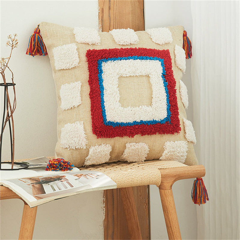 Cream tufted boho pillow cover with red and navy square medallion design