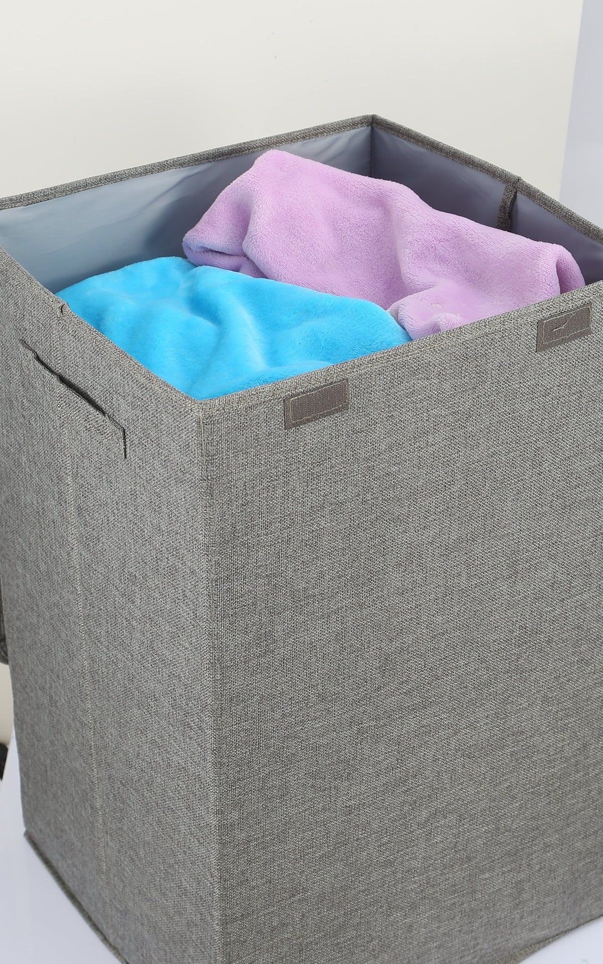 Foldable laundry hamper in grey