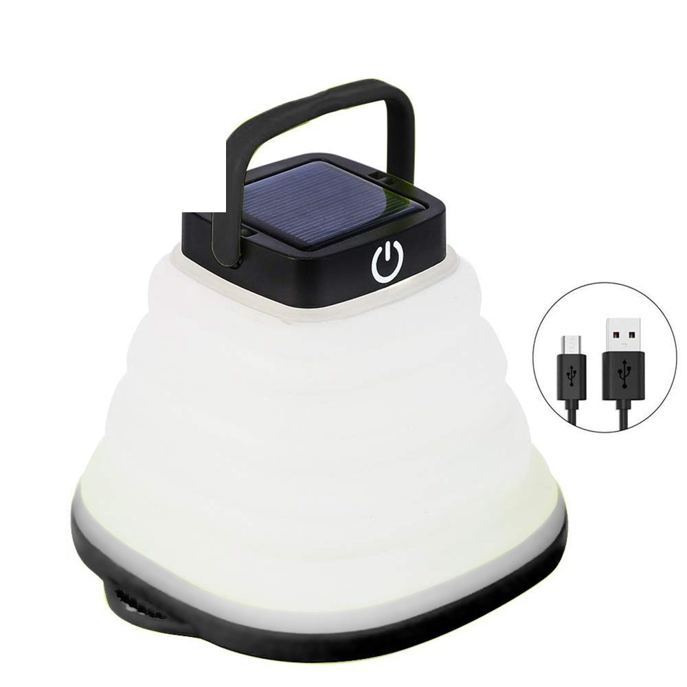 Solar camping lantern in green with USB charging cable