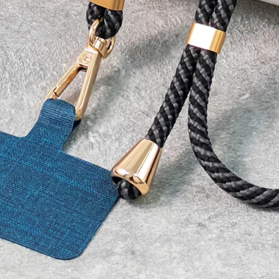 Phone Crossbody Lanyard — patch and attachment hardware detail