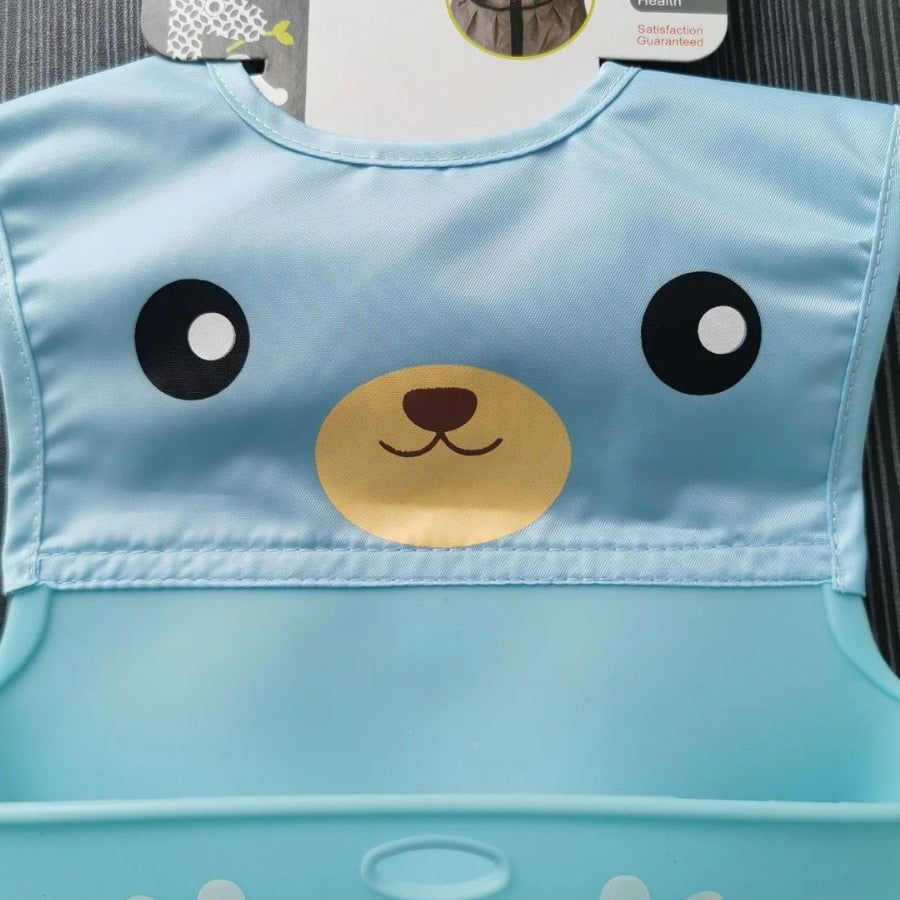 Silicone Baby Bib — close view of the bear face print and crumb pocket
