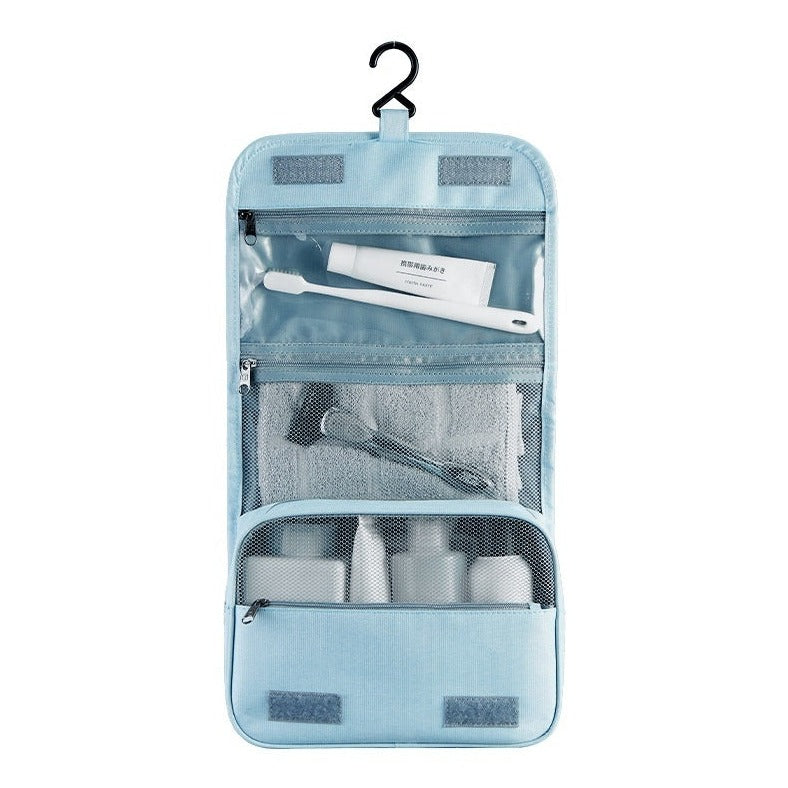 Hanging toiletry bag in glacier blue, open